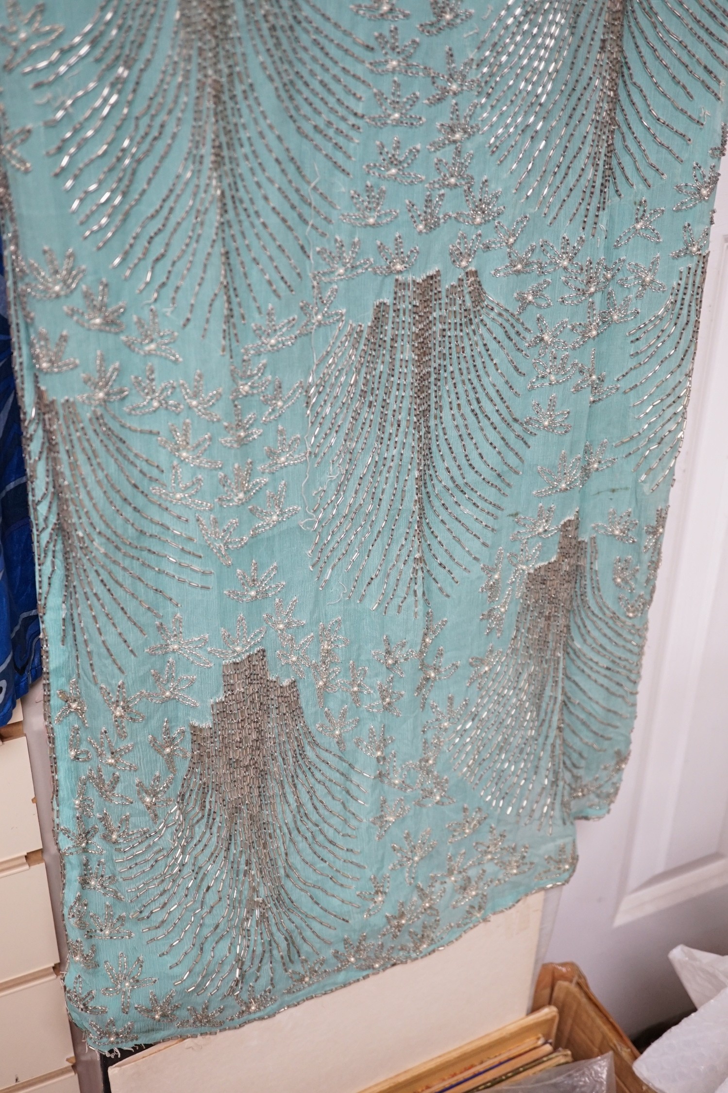 A 1940's turquoise chiffon evening dress and peacock designed shawl owned by Princess Sevilla Hercolani
